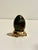 Bloodstone crystal egg with a gold stand 